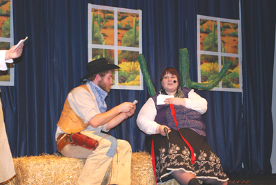 Acting out an old west scene.