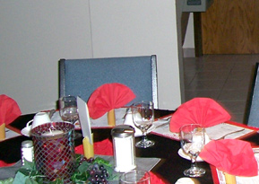 Table set up for murder mystery dinner theatre.