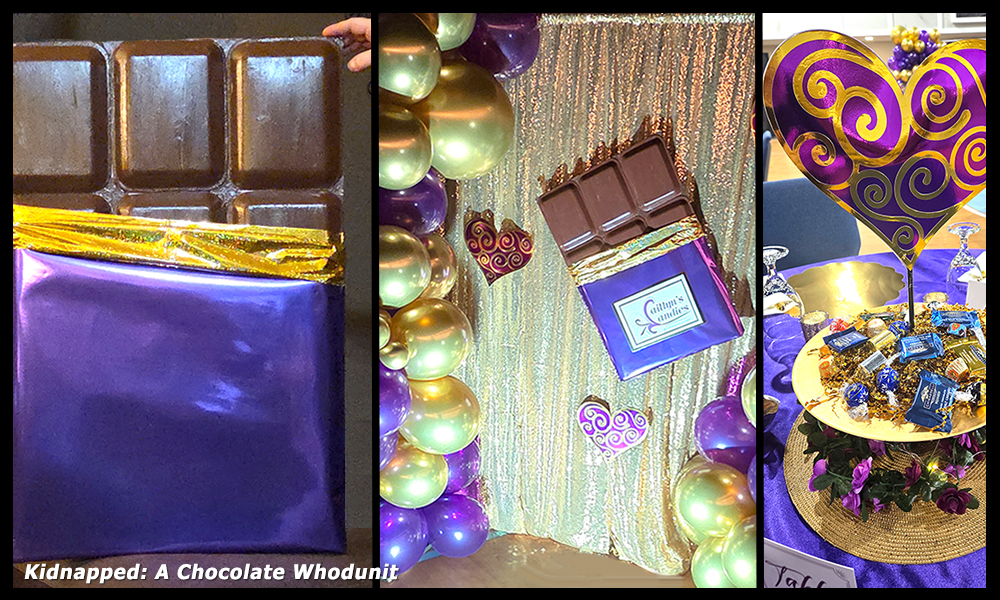 Gigantic chocolate bar prop with photo op curtain and table decor.